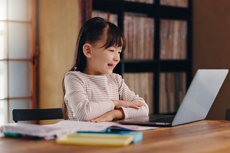 Child learning on laptop